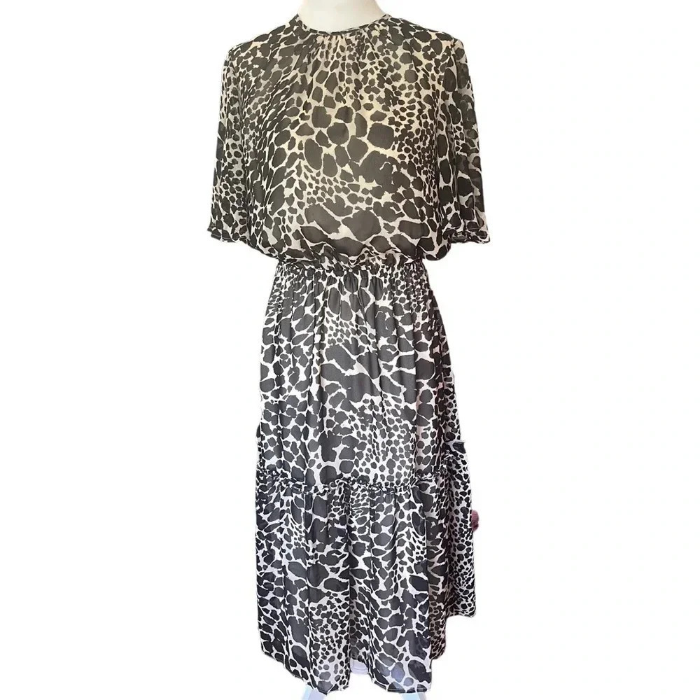 Who What Wear NWT animal print dress. Sz Small. Short sleeves, midi length.